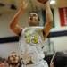 Huron senior Mike Lewis makes a basket during a district match up at Pioneer on Wednesday. Melanie Maxwell I AnnArbor.com